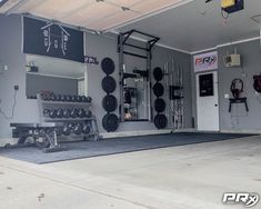 an empty garage with lots of equipment in it