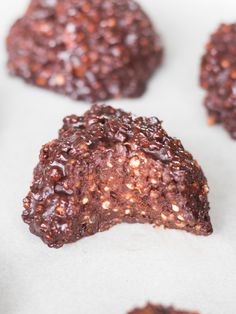 chocolate cookies are sitting on a baking sheet