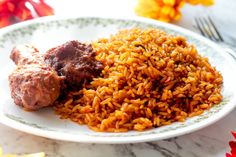 16 Nigerian Recipes Everyone Needs To Try Nigerian Jollof Rice Recipe, Party Jollof Rice, Nigerian Jollof Rice, Jollof Rice Recipe, Starchy Sides, Continental Cuisine, East Recipes, Nigerian Party