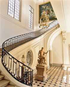 an image of a staircase in a house that looks like it is going down the stairs