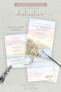 the wedding stationery is set up on top of a table with an envelope, pen and