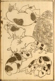 an old cartoon book with cats and dogs in the pages, one is black and white