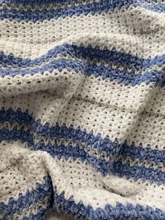 This adorable blue, grey and white pattern is the sweetest gift for a new baby boy. Grey And White Crochet Blanket, White And Blue Crochet Blanket, White And Blue Crochet, Blue Crochet Blanket, Holiday Bedroom Decor, Knit Scarfs, Blue Afghan, Holiday Bedroom, Striped Blankets