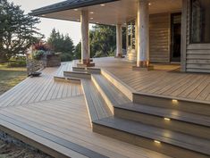 a wooden deck with steps leading up to it