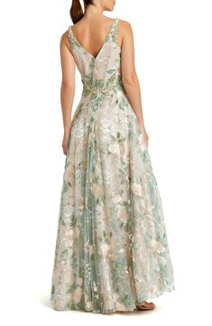 A mesh panel at the deeply plunged neckline lets you conquer cocktail hour with total confidence in this exquisitely embroidered, absolutely gorgeous gown. Hidden back-zip closure Plunge neck with mesh panel Lined 100% polyester Spot clean Imported Asian Owned/Founded Luxury Floral Applique Evening Dress For Banquets, Formal Dresses Long Embroidered, Floral Embroidered Dress Formal, Mint Green Mother Of The Bride Dress, Elegant V-neck Gown With Floral Embroidery, V-neck Floral Embroidered Evening Dress For Prom, V-neck Evening Dress With Floral Embroidery For Prom, Floral Embroidered V-neck Evening Dress For Prom, Floral Embroidered V-neck Prom Evening Dress