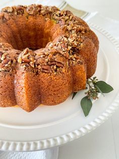 a close up of a bundt cake on a plate with the words, scrumptious bacardi rum cake from a box mix