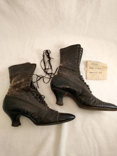 "Wonderful note with these boots - worn by Mom in 1913. Authentic Victorian era lace up boots, condition okay - with wear and age but still intact with integrity. Label is Physical Culture Shoes For Style and Ease Em Henne Co. Brooklyn N.Y.. Sold at M Myers & Son New Haven. See photos for wear - worst area back of the right boot where there is a loss of surface and some small tears to leather. Not tiny in size, footbed from the outside 10 3/4\", 2 3/4\" wide, heel height 2.5\" shaft height 9 Vintage Lace-up Boots With Leather Sole For Formal Occasions, Vintage Lace-up Boots With Pointed Toe And Leather Sole, Historical Formal Boots With Round Toe, Historical Round Toe Boots For Formal Occasions, Historical Round Toe Formal Boots, Vintage Lace-up Boots For Formal Fall Events, Vintage Lace-up Boots For Formal Fall Occasions, Vintage Heeled Boots With Pointed Toe And Leather Sole, Vintage Leather Lace-up Boots With Pointed Toe