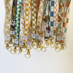 several lanyards with key chains hanging from them