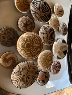 several baskets are arranged on the hood of a car