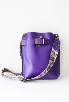 Purple Leather Cross body Bag for women, Handmade from the finest softest Full Grain leather by our own minimalist unique design. Light and Practical Small Leather Bag for everyday use. Super Adjustable Crossbody leather or webbing strap, that can be adjusted to Shoulder Bag length as well.  * Simple, Elegant Design; * Size : Small; * Color: Purple * High Quality, Soft natural leather; * Safe - Front buckle and button snap closing mechanism; * Interior pocket with zipper; * Optional Back Pocket Everyday Crossbody Belt Bag With Leather Handles, Everyday Leather Handles Belt Bag Crossbody, Leather Hobo Bag With Mobile Phone Pouch, Modern Crossbody Shoulder Bag With Leather Strap, Versatile Crossbody Bag With Leather Strap, Leather Bucket Bag With Detachable Strap As Gift, Leather Phone Bag With Detachable Strap In Tote Shape, Leather Strap Bucket Shoulder Bag For Everyday Use, Leather Crossbody Hobo Bag With Mobile Phone Bag