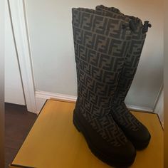 Fendi Ff Monogram Snow Boot I’m Great Condition Box Included Sz 40 Fendi Snow Boots, Fendi Combat Boots, Fendi Boots 2022, Luxury Winter Boots With Faux Fur Trim, Fendi Shoes, Winter Rain, Snow Boots, Rain Boots, Black And Brown