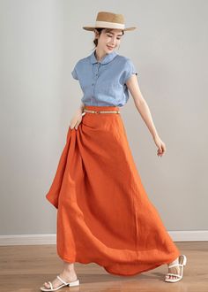 "This orange A-line linen midi skirt is made from high-quality linen material, which is soft, comfortable, and breathable. The bright and vibrant color makes you stand out in the crowd. The wide hemline adds an elegant and flowing movement to your look. The high-waisted design highlights your waistline, creating a flattering silhouette. Pair it with a lace top or a loose-fitting t-shirt to create different fashion styles. This skirt is suitable for various occasions such as dates, parties, and v Long Orange Skirt, Flowy Long Skirt, Orange Maxi Skirt, Custom Skirt, Midi Skirts Summer, Linen Midi Skirt, Skirt Flowy, Long Flowy Skirt, Linen Summer