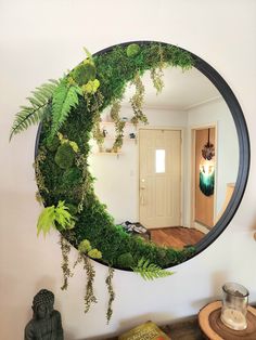 a mirror that has some plants on it