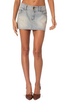 An on-trend low-rise cut defines this nonstretch-denim skirt featuring fading and distressing for a chic lived-in look. Zip fly with button closure Five-pocket style 100% cotton Machine wash, dry flat Imported Fitted Medium Wash Mid-rise Mini Skirt, Summer Stretch Cutoff Mini Skirt, Fitted Mid-rise Mini Skirt In Medium Wash, Fitted Medium Wash Mini Skirt With Mid-rise, Fitted Cutoff Denim Skirt In Denim Blue, Fitted Cutoff Denim Blue Mini Skirt, Fitted Cutoff Denim Mini Skirt, Fitted Denim Cutoff Mini Skirt, Light Wash Fitted Denim Skirt