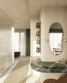 a bathroom with a marble sink and mirror