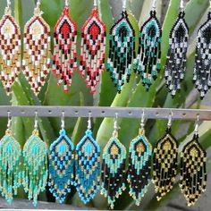 Traditional Mexican Handmade Huichol chaquira (beaded) earrings made by Mexican artisans in the Mexican state of Chipas. The earrings are lightweight, colorful and sure to bring you lots of compliments.