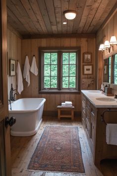 a large bathroom with wood paneled walls and flooring, along with a white bathtub