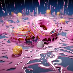 a pink donut with sprinkles and other items on the ground in front of it