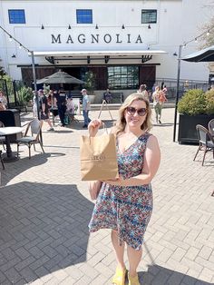 Food and Travel Blogger Jenna Passaro from Sip Bite Go Visiting Magnolia Silos in Waco Texas Grass Field, Soccer Balls