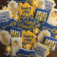 some decorated cookies are sitting on a table