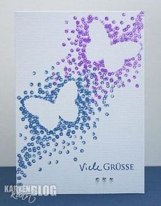 a card with purple and blue hearts on it