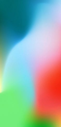 an abstract blurry background with red, green and blue colors