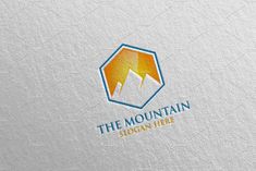 the mountain logo is shown on a white paper background with blue and orange colors,