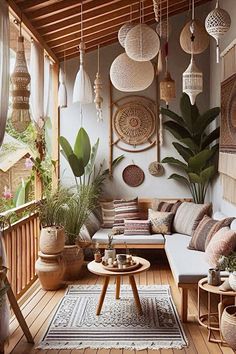 a living room filled with lots of plants and hanging baskets on the wall next to a couch