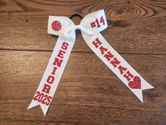 Collegiate Style Volleyball Bows. Each bow is 5.5" x 9" in size. Bows are attached to high-quality hair elastic. Bow and glitter font can be customized to meet your needs. Volleyball Bows, Collegiate Style, Volley Ball, Hair Elastics, Barrette Clip, Barrettes, Volleyball, Elastic, Hair Accessories