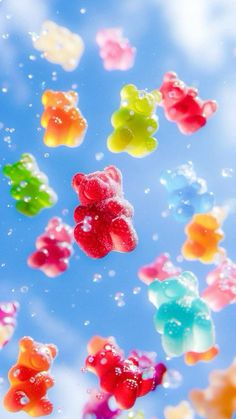 gummy bears floating in the air on a sunny day