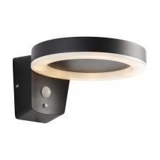 a black wall mounted light with a white ring