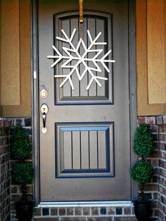 a front door with a snowflake on it