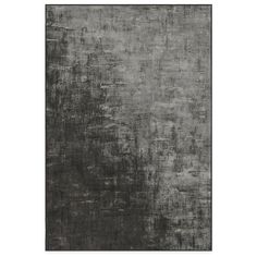 a black and white area rug with an abstract design on the bottom, in grey tones