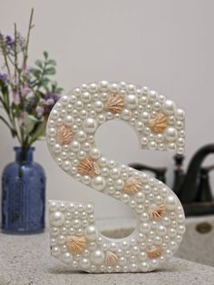 Pearl Sorority Letters, Beach Room Theme, Seashell Room Decor, Letter Painting Ideas Wooden, Bedazzle Ideas, 3d Letters Decoration, Seashell Letter, Wooden Letters Decorated, Painted Initials