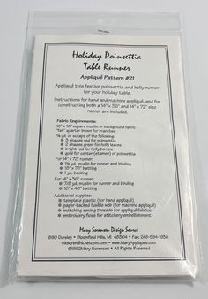 a package with instructions on how to use the holiday picnic table runner for an appetizing party