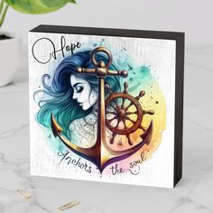 a card with an anchor and wheel on the front, says hope anchors the soul