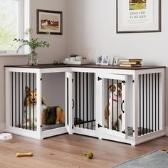 two dogs are sitting in their kennels on the floor next to each other