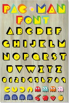 the alphabet and numbers are made out of wooden letters with pacman faces on them