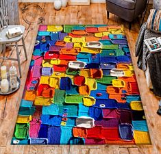 a multicolored area rug is on the floor