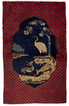 This one-of-a-kind ANTIQUE CHINESE PAO TAO DO was hand-woven of 100% wool in China over 100 years ago. It has a large, ornate patterned border and a beautiful pastoral scene featuring small deer and a graceful crane. This unique rug was woven by hand using shades of indigo, creamy beige and deep red. Its excellent quality and great condition make it a timeless piece of craftsmanship. Shades Of Indigo, Tibet Tiger Rug, Tibetan Antelope, Small Deer, Tibetan Tiger Rug, Chinese Rug, 100 Years Ago, Unique Rug, Unique Rugs