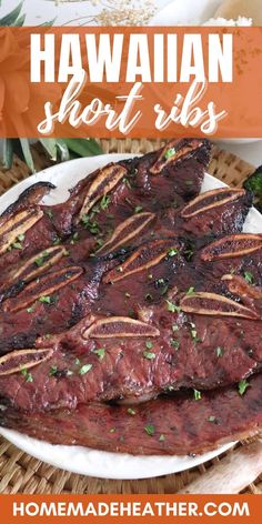 the hawaiian short ribs are served on a white plate with garnish and parsley