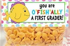 a fish themed birthday party treat in a bag with the words, you are fish ally a first grader