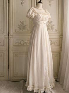 Immerse yourself in the elegance of the Regency era with this exquisite cream Bridgerton-inspired dress. Perfect for brides and special occasions, this gown combines vintage charm with luxurious details, making it a timeless addition to your wardrobe. Elegant Design: Featuring a classic Regency silhouette, this dress boasts puffed sleeves and a gracefully flowing skirt. The delicate chiffon ruffles and floral appliqués add a touch of romantic charm, while the beaded embellishments enhance its so Regency Era Nightgown, Regency Nightgown, Regency Silhouette, Regency Era Dress, Regency Dresses, Nontraditional Wedding Dress, Wedding Dresses High Low, Champagne Evening Dress, Floral Applique Dress