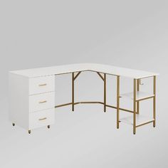 a white desk with gold trimmings and drawers on the bottom, in front of a gray background