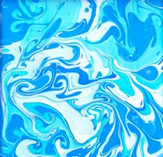 an abstract blue and white background with swirls