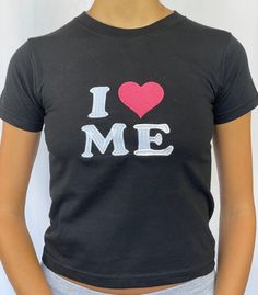 "I ♥ ME baby tee 100% cotton available in sizes xs - xl - see photo 3 for sizing Model is wearing size S and is a 6/8 - For reference, model is 5'5 with 31\" bust and 26\" waist baby tee with i love / heart me embroidery" Cute Fitted T-shirt With Heart Graphic, Fitted Basic T-shirt With Slogan, Fitted T-shirt With Heart Graphic For Streetwear, Fitted Cotton Cropped T-shirt With Graphic Print, Fitted Cotton Graphic Tee, Fitted Casual T-shirt With Heart Graphic, Fitted Crew Neck Top With Heart Graphic, Cotton Stretch T-shirt With Text Print, Cropped Graphic Tee Cotton Stretch