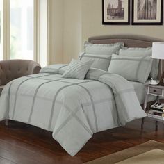 the comforter is made up and ready for someone to use it in their home