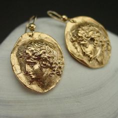 Handmade Apollo earrings.Apollo was considered to be the most handsome of all the gods. His powers generally related to prophecy and the ability to foretell the future.He was the god of light and the sun. and as the god of healing Apollo was known to stop us from repeating our mistakes over and over again.Of course he is immortal, has superhuman qualities and vitality and has the ability to heal others.Apollo is not all good though. There is a dark side to him too. Apollo is the God of destructi Greek Mythology, God Of Healing, Antique Cameo Jewelry, God Of Light, Ancient Greek Jewelry, Rome Antique, Cameo Jewelry, Greek Jewelry, Ancient Rome