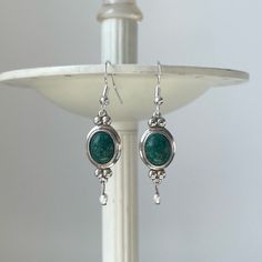 Coleman Co Southwestern Sterling Silver Dangle Earring In Malachite. Earring Findings Are Not Original, Replaced With Sterling Silver (Marked 925, See Second To Last Photo) Shepard Hook. Stone Is Malachite. Freshwater Pearls Dangle For The Ends Of Each Earring. Backs On Earrings Are Marked Cco (See Last Photo). New Without Tags. Length: 1.5 Inches Approx Stone Size: 9mm Approx Weight Of Individual Earring: 2.7 Approx Shepards Hook, Sterling Silver Dangle Earrings, Earring Findings, Earring Backs, Freshwater Pearls, Ash, Dangle Earrings, Jewelry Earrings, Fashion Jewelry