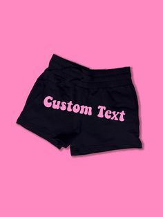 Custom Text Fleece Shorts | Cute Booty Shorts | Y2K Shorts | Cute Shorts | Funny Shorts | Warm Fleece Shorts | Lounge Shorts | Comfy Shorts to Lounge in! Actual item may be lighter/darker than pictured. M A T E R I A L S - 57% Cotton / 38% Polyester / 5% Spandex - Adjustable Drawstring Waistband - High Waisted - Two Side Pockets S I Z I N G - Size chart is available on our listing photos. S H I P P I N G  &  P R O D U C T I O N  T I M E - Production Time is 2-3 Business Days. (May be delayed dur Leisure Short Pants With Built-in Shorts, Trendy Letter Print Leisure Shorts, Trendy Athletic Shorts With Built-in Liner For Leisure, Athleisure Shorts With Letter Print For Leisure, Trendy 2-in-1 Athletic Shorts For Leisure, Leisure Shorts With Letter Print, Leisure Letter Print Short Bottoms, Leisure Letter Print Shorts, Fitted Black Bottoms For Leisure